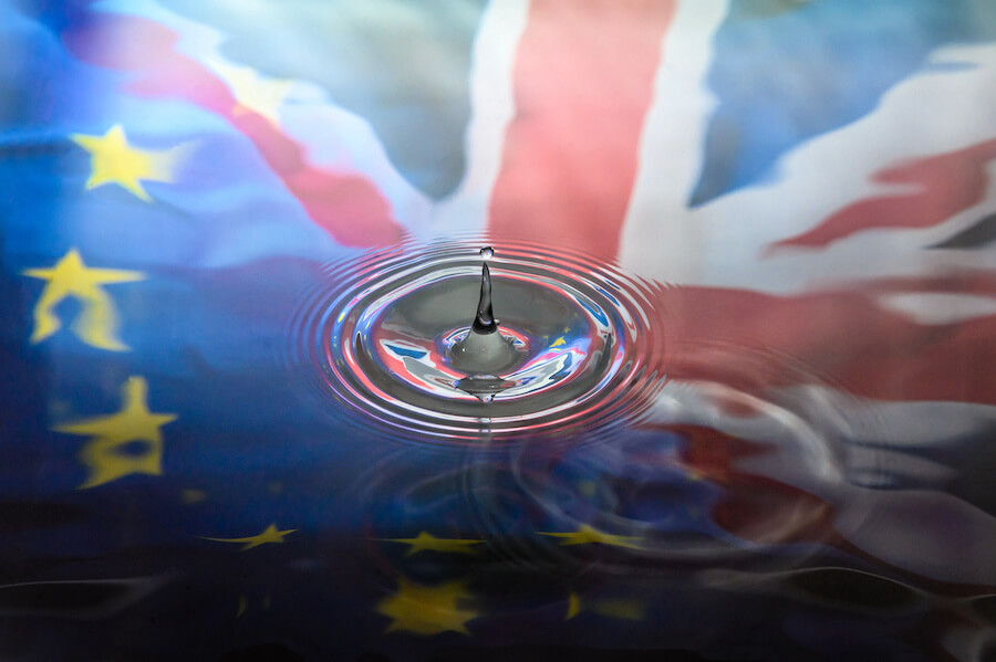 Water reflecting the EU and UK flags